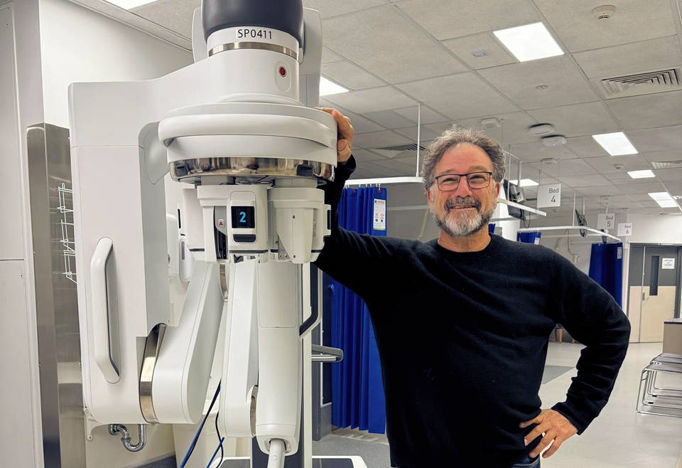 Prof Stricker with the Single Port Robot